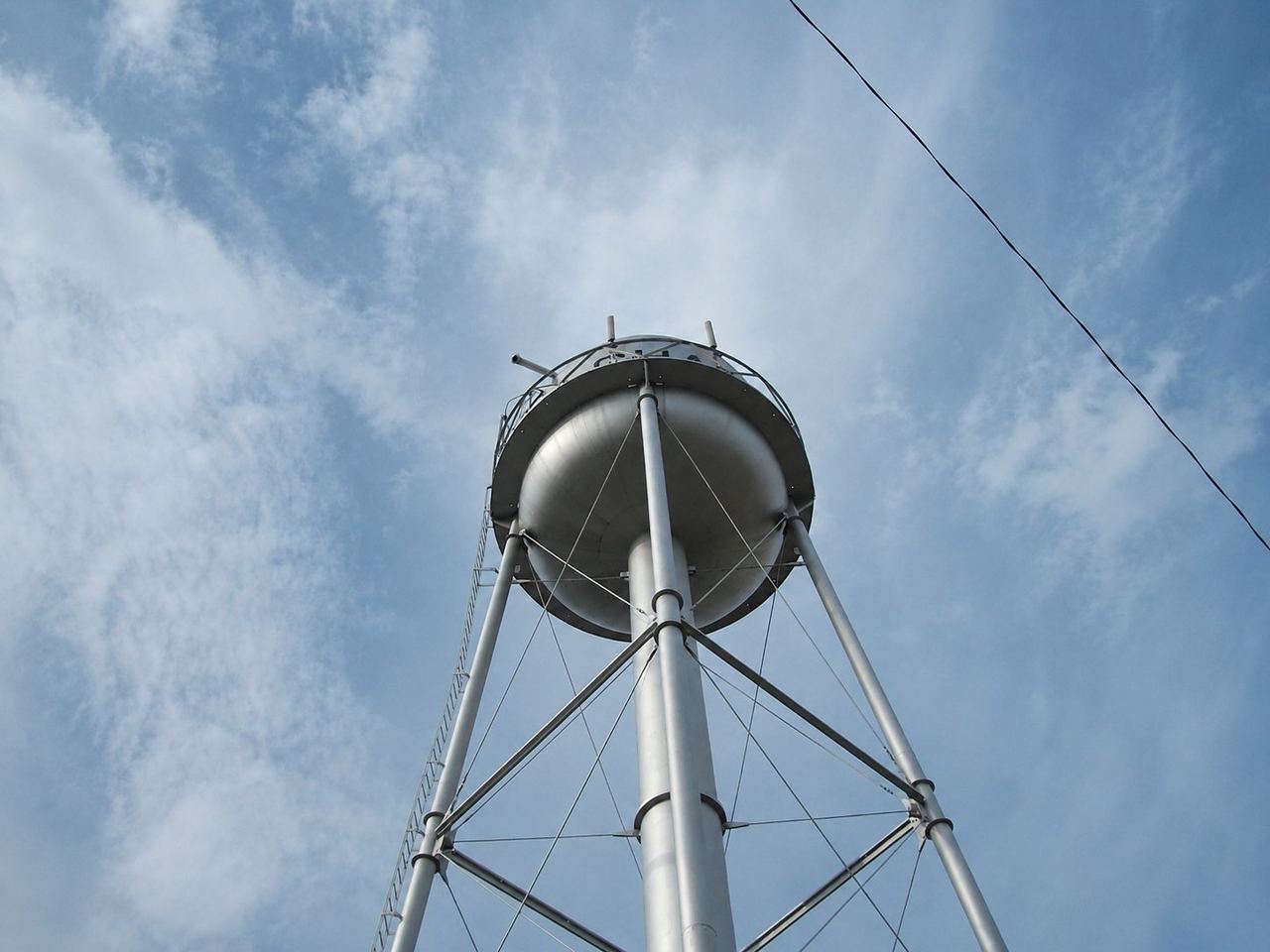 Classic legged spheroid municipal water tower serving a community