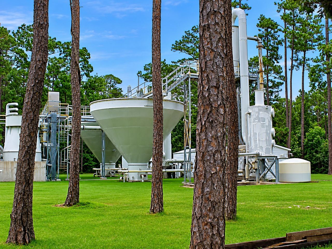 Engineered package water treatment plant among pine trees