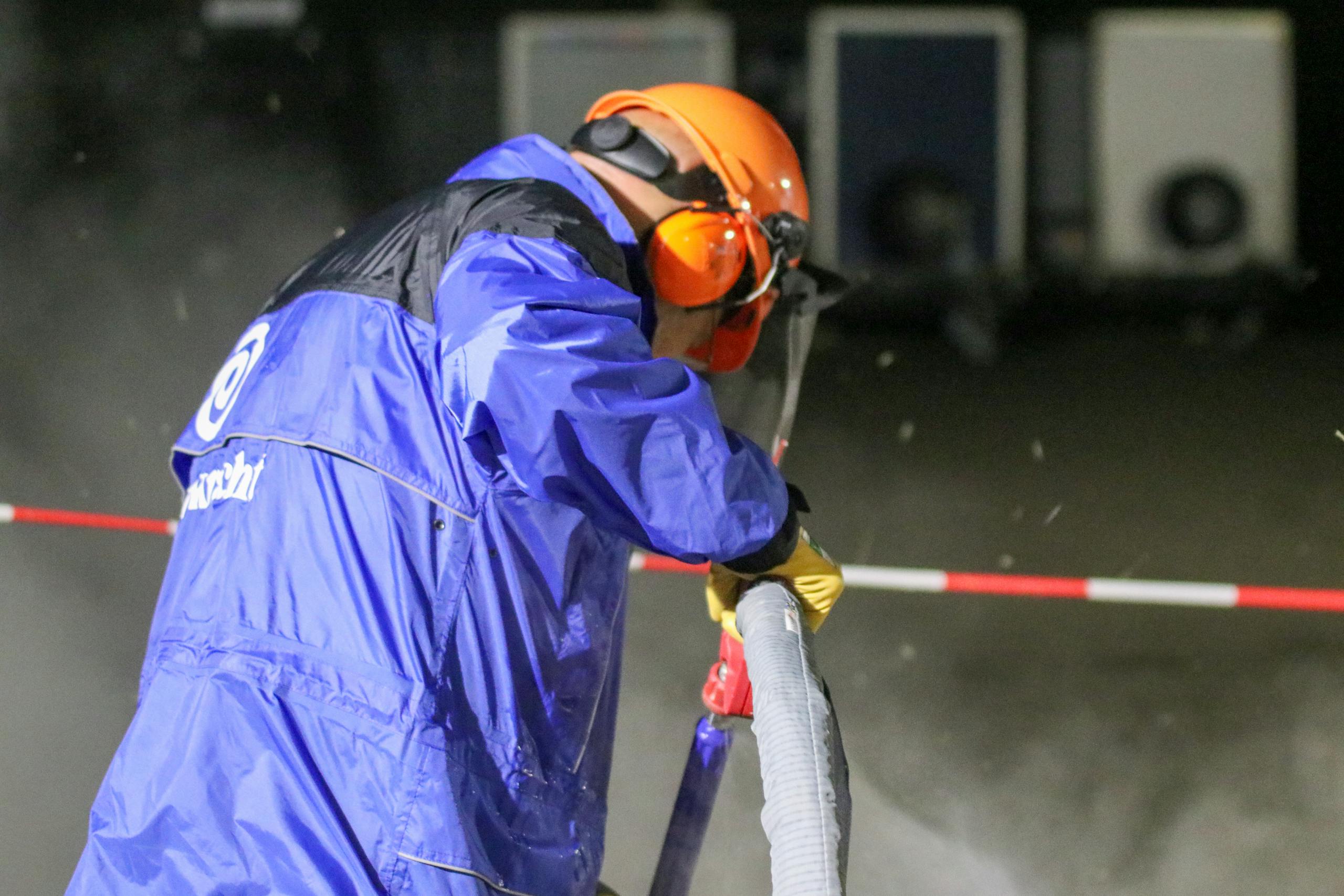 Water treatment worker performing chlorine residual testing at a facility