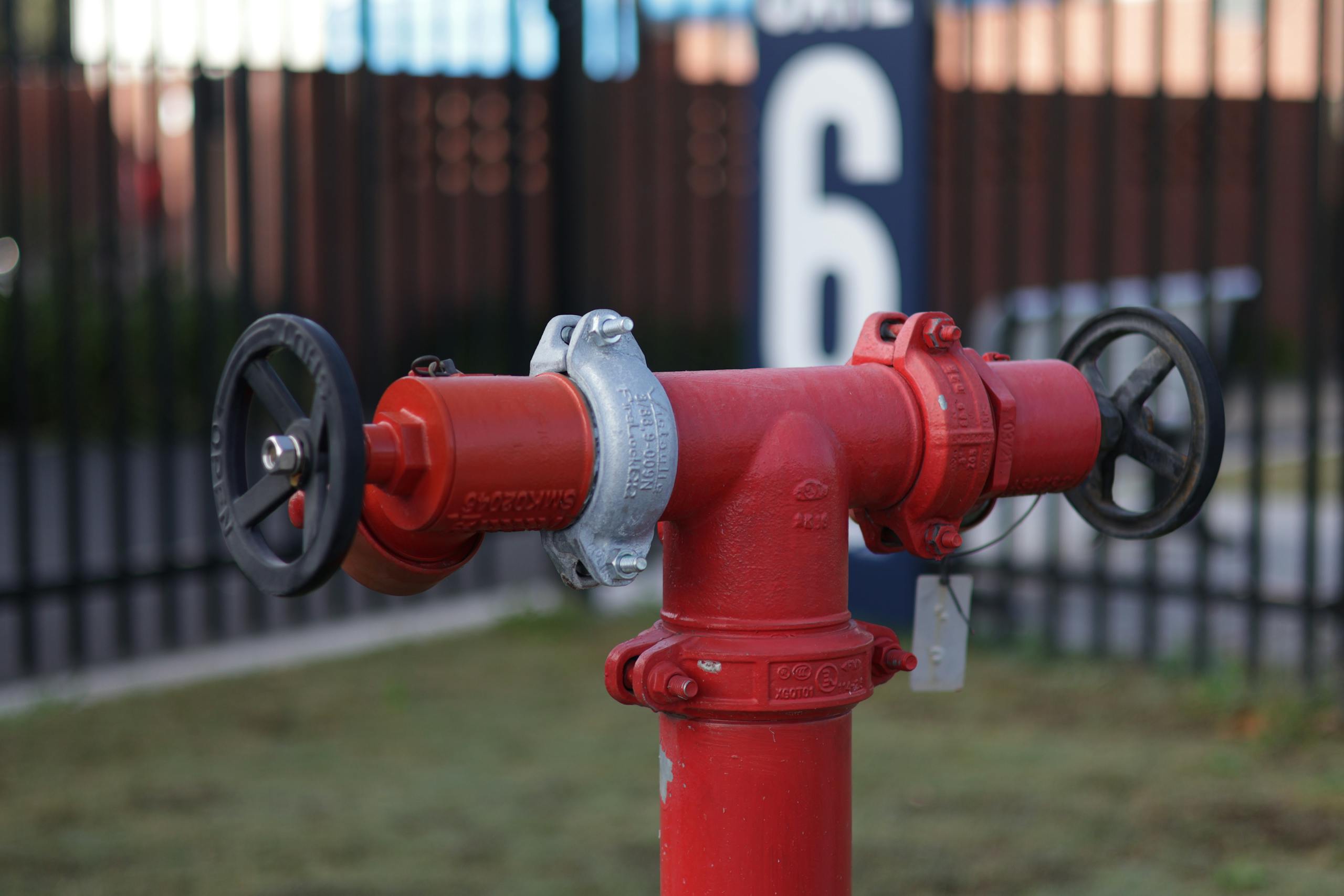 Red industrial valve hydrant used in cross-connection control