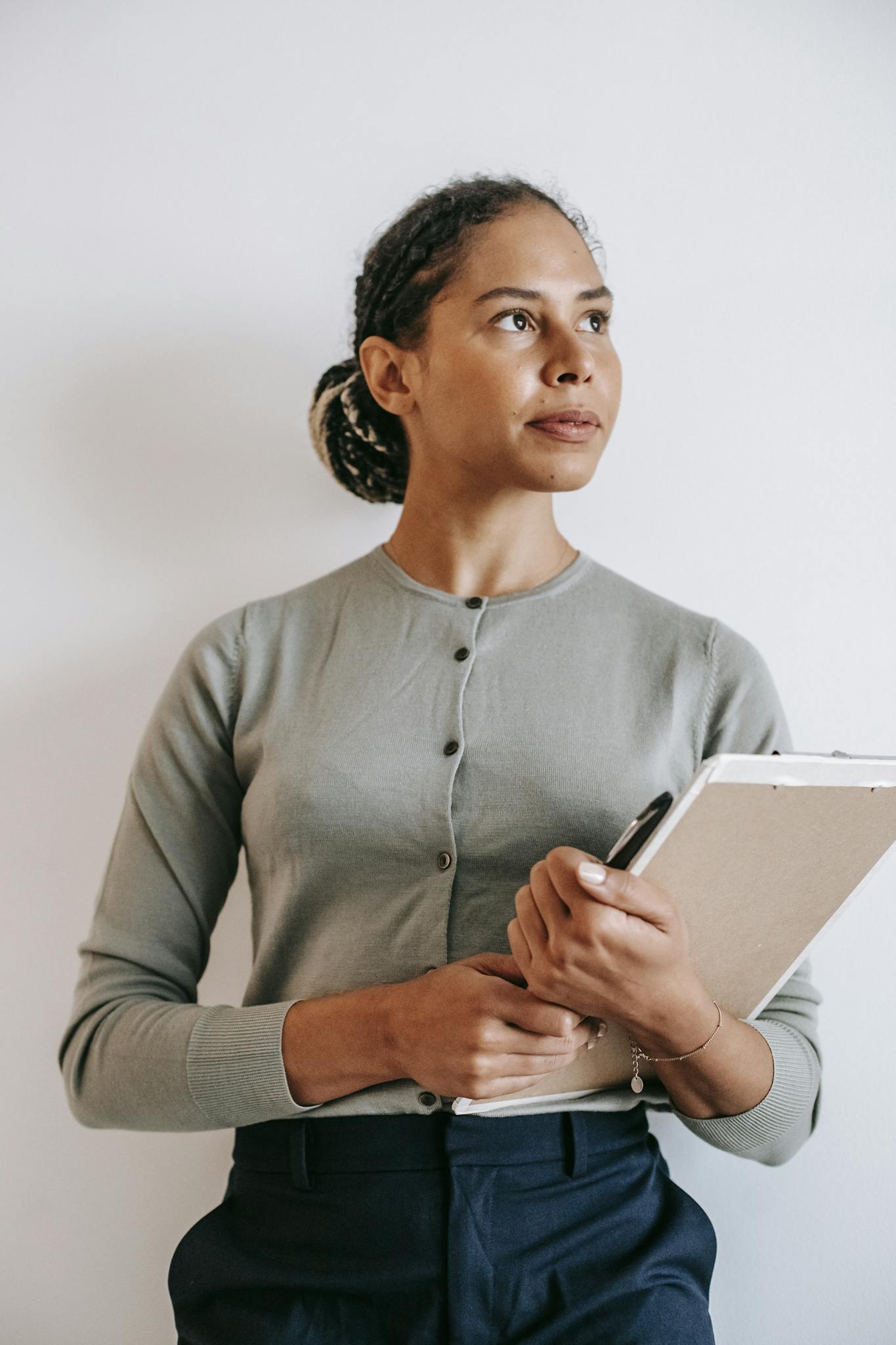Professional woman with clipboard representing continuing education for water operators
